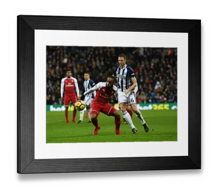Framed Print : Lacazette vs Evans: Intense Battle in West Bromwich Albion vs Arsenal Premier League Clash Framed Print : Lacazette vs Evans: Intense Battle in West Bromwich Albion vs Arsenal Premier League Clash