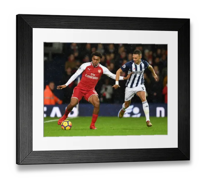 Framed Print : Arsenal's Alex Iwobi vs. Kieran Gibbs: A Premier League Face-Off Framed Print : Arsenal's Alex Iwobi vs. Kieran Gibbs: A Premier League Face-Off