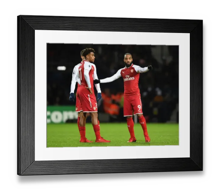 Framed Print : Arsenal's Alex Iwobi and Alex Lacazette in Deep Conversation during West Bromwich Albion Match