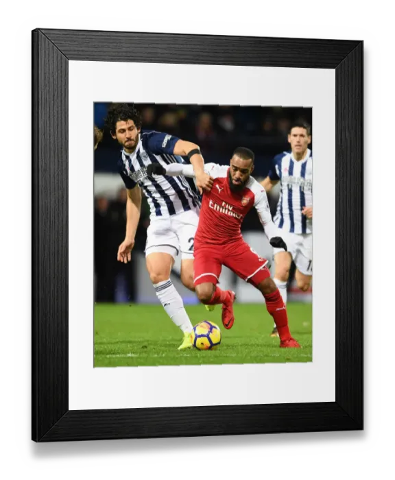 Framed Print : Arsenal's Alex Lacazette Clashes with Ahmed Hegazi in Premier League Showdown (West Bromwich Albion vs Arsenal, 2017-18) Framed Print : Arsenal's Alex Lacazette Clashes with Ahmed Hegazi in Premier League Showdown (West Bromwich Albion vs Arsenal, 2017-18)