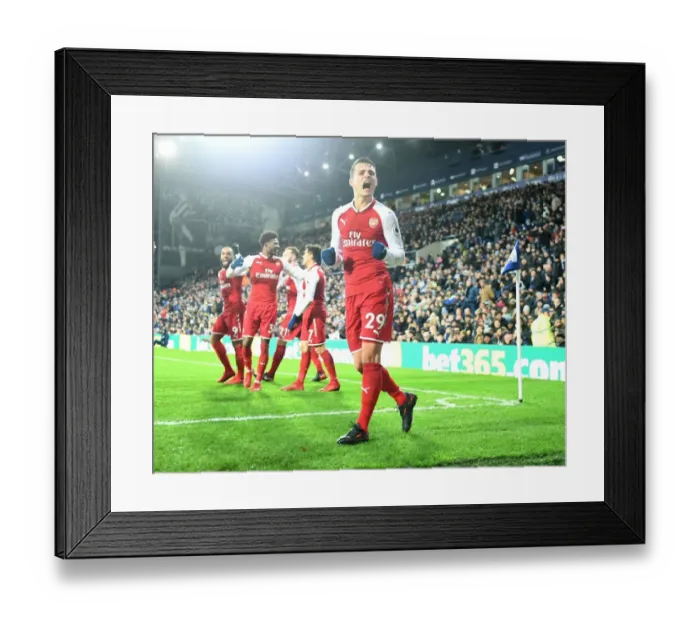 Framed Print : Granit Xhaka's Euphoric Goal Celebration: Arsenal's Triumph over West Bromwich Albion (2017-18) Framed Print : Granit Xhaka's Euphoric Goal Celebration: Arsenal's Triumph over West Bromwich Albion (2017-18)