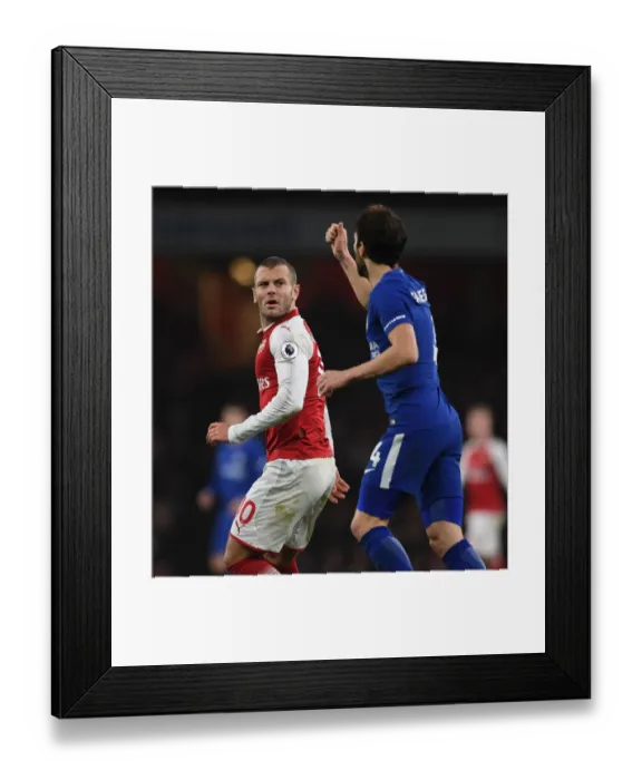 Framed Print : Arsenal vs. Chelsea: Wilshere and Fabregas Face Off in Intense Premier League Rivalry