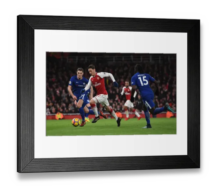 Framed Print : Clash of the Midfield Masters: Ozil vs. Christensen - Arsenal vs. Chelsea Showdown Framed Print : Clash of the Midfield Masters: Ozil vs. Christensen - Arsenal vs. Chelsea Showdown