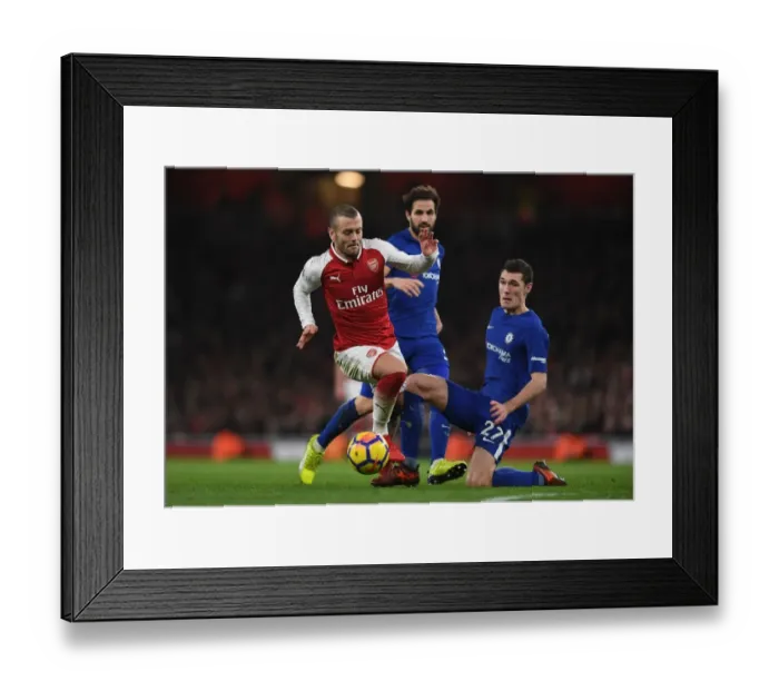 Framed Print : Arsenal's Jack Wilshere Clashes with Chelsea's Andreas Christensen in Premier League Showdown Framed Print : Arsenal's Jack Wilshere Clashes with Chelsea's Andreas Christensen in Premier League Showdown