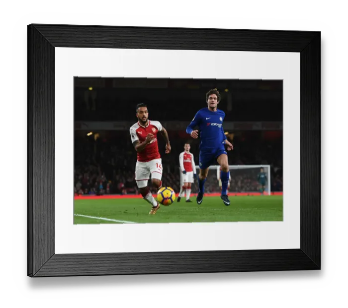 Framed Print : Theo Walcott vs. Marcos Alonso: A Battle at the Emirates - Arsenal v Chelsea, Premier League 2017-18