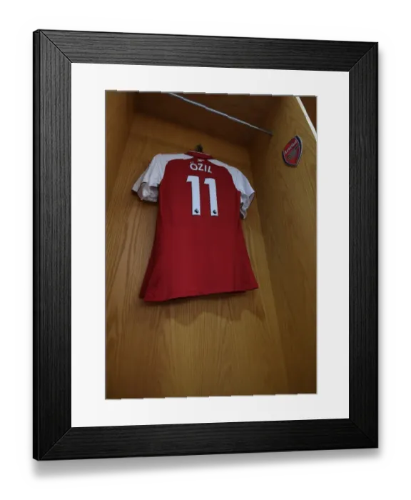 Framed Print : Mesut Ozil's Arsenal Shirt in Arsenal Changing Room Before Arsenal vs Chelsea (2017-18)