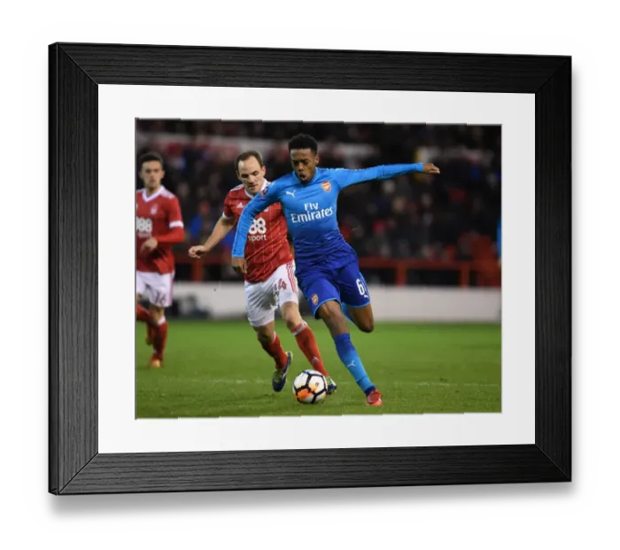 Framed Print : Joe Willock Breaks Past David Vaughan: Nottingham Forest vs. Arsenal - FA Cup Third Round Showdown Framed Print : Joe Willock Breaks Past David Vaughan: Nottingham Forest vs. Arsenal - FA Cup Third Round Showdown