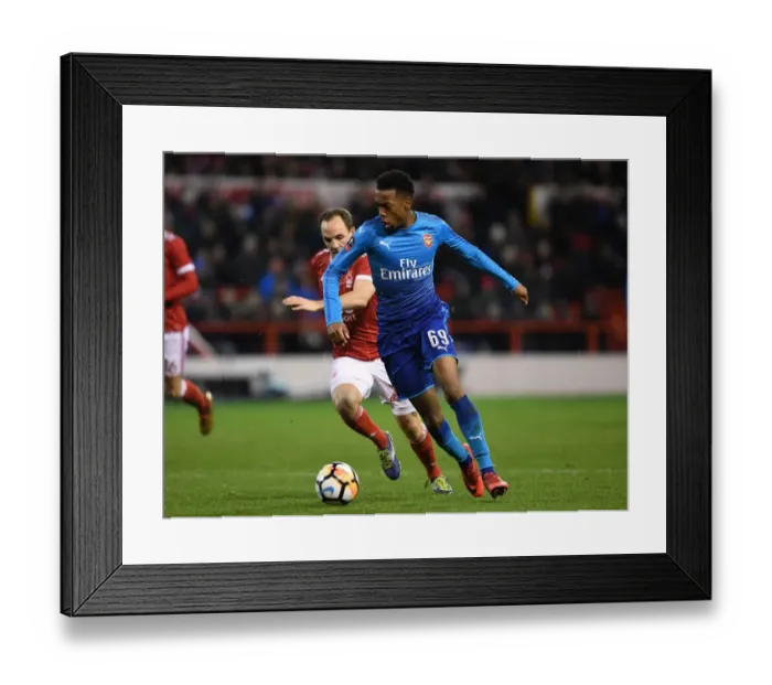 Framed Print : Arsenal's Joe Willock Brushes Past Nottingham Forest's David Vaughan in FA Cup Clash