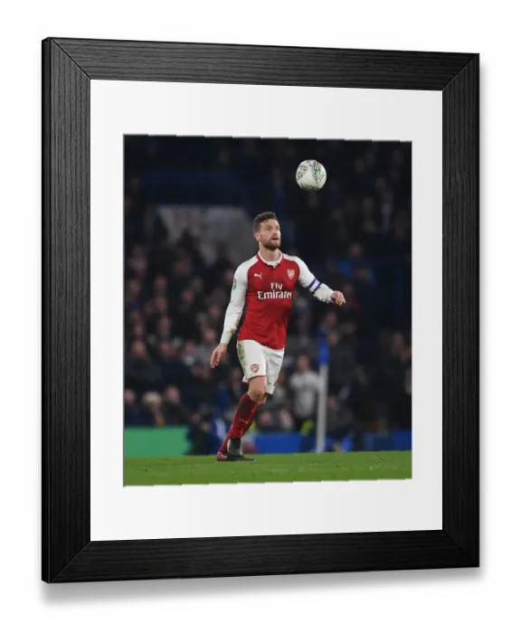 Framed Print : Shkodran Mustafi in Action: Chelsea vs. Arsenal - Carabao Cup Semi-Final First Leg