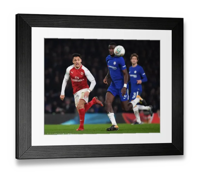 Framed Print : Showdown at Stamford Bridge: A Clash of Stars - Alexis Sanchez vs. Antonio Rudiger, Carabao Cup Semi-Final