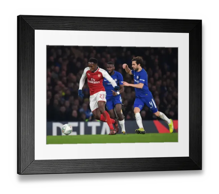 Framed Print : Danny Welbeck vs. Cesc Fabregas: Clash in the Carabao Cup Semi-Final Framed Print : Danny Welbeck vs. Cesc Fabregas: Clash in the Carabao Cup Semi-Final