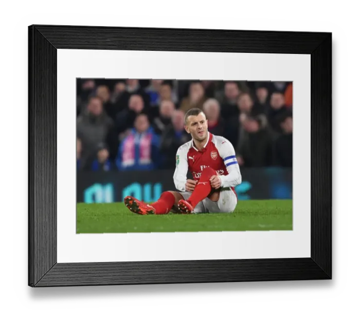Framed Print : Jack Wilshere Suffers Injury: Chelsea vs Arsenal, Carabao Cup Semi-Final