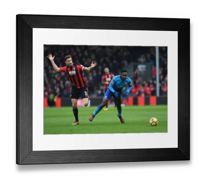 Framed Print : Clash at Vitality: Welbeck and Francis Lock Horns in AFC Bournemouth vs Arsenal Showdown