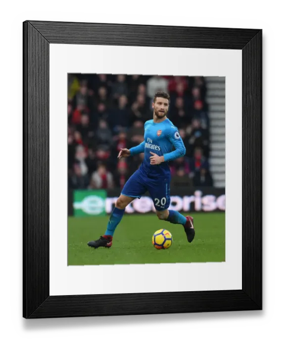 Framed Print : Shkodran Mustafi Focuses in AFC Bournemouth vs Arsenal Premier League Clash Framed Print : Shkodran Mustafi Focuses in AFC Bournemouth vs Arsenal Premier League Clash