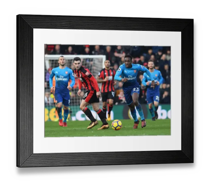 Framed Print : Danny Welbeck vs. Lewis Cook: Intense Battle in AFC Bournemouth vs. Arsenal Premier League Clash
