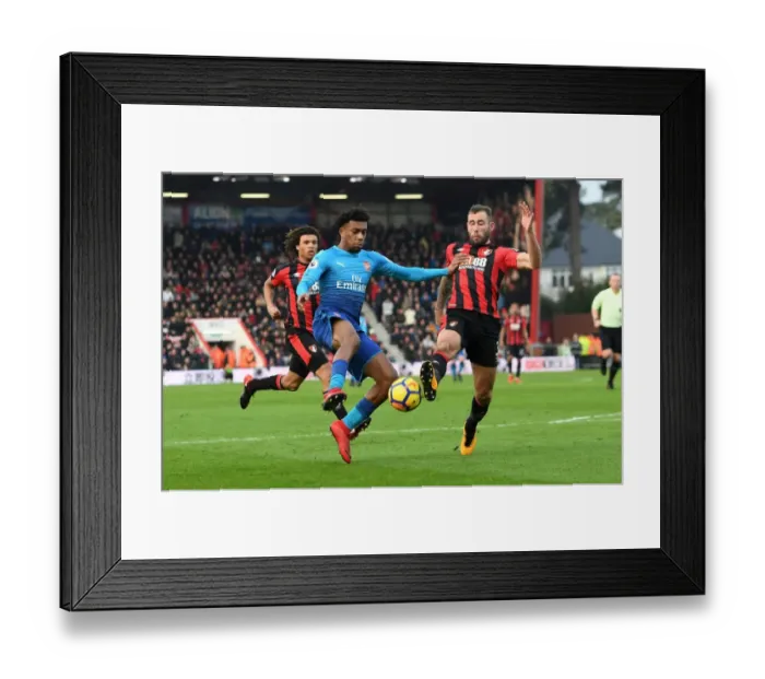 Framed Print : Clash at Vitality: Iwobi vs Cook in AFC Bournemouth vs Arsenal Framed Print : Clash at Vitality: Iwobi vs Cook in AFC Bournemouth vs Arsenal