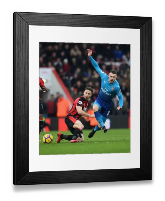 Framed Print : Aaron Ramsey vs. Adam Smith: Intense Battle in AFC Bournemouth vs. Arsenal Premier League Clash