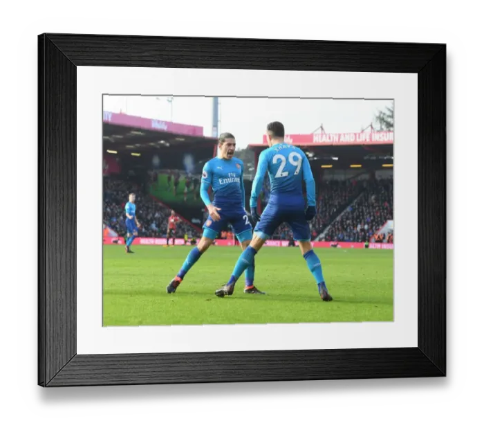 Framed Print : Arsenal's Bellerin and Xhaka: United in Victory - Celebrating a Goal Against Bournemouth (2018)