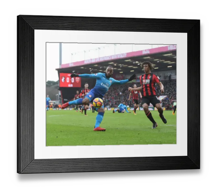 Framed Print : Clash of Titans: Lacazette vs Ake in AFC Bournemouth vs Arsenal Premier League Showdown