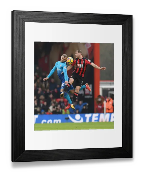 Framed Print : Clash of Midfield Titans: Wilshere vs. Gosling - AFC Bournemouth vs. Arsenal, Premier League Showdown Framed Print : Clash of Midfield Titans: Wilshere vs. Gosling - AFC Bournemouth vs. Arsenal, Premier League Showdown