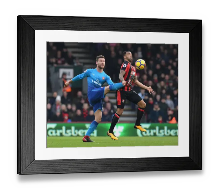 Framed Print : Mustafi vs. Wilson: Intense Clash in AFC Bournemouth vs. Arsenal Premier League Match