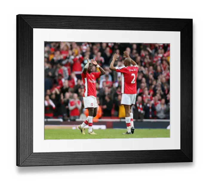 Framed Print : Emmanuel Eboue celebrates at the end of the match with Abou Diaby Framed Print : Emmanuel Eboue celebrates at the end of the match with Abou Diaby