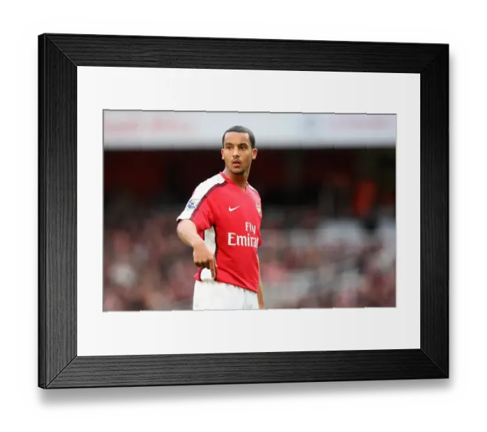 Framed Print : Theo Walcott's Brilliant Performance: Arsenal's 4-0 Victory Over Blackburn Rovers in the Premier League