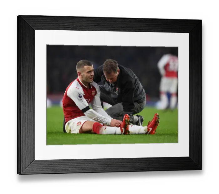 Framed Print : Arsenal: Jack Wilshere Receives Treatment from Physio Colin Lewin vs Crystal Palace, Premier League Framed Print : Arsenal: Jack Wilshere Receives Treatment from Physio Colin Lewin vs Crystal Palace, Premier League