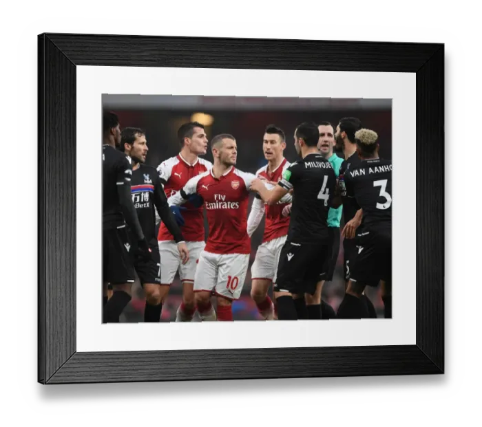 Framed Print : Arsenal's Xhaka and Wilshere Go Head-to-Head with Van Aanholt and Milivojevic: A Midfield Battle in Arsenal vs. Crystal Palace Clash