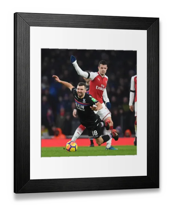 Framed Print : Clash at Emirates: Xhaka vs McArthur in Arsenal's Battle Against Crystal Palace Framed Print : Clash at Emirates: Xhaka vs McArthur in Arsenal's Battle Against Crystal Palace