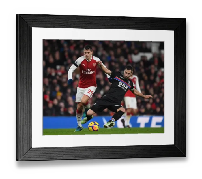 Framed Print : Midfield Showdown: Xhaka vs. Milivojevic in the Arsenal vs. Crystal Palace Premier League Battle