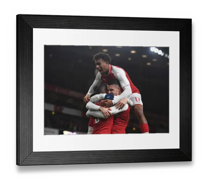 Framed Print : Arsenal's Xhaka, Lacazette, and Iwobi Celebrate Goals in Carabao Cup Semi-Final against Chelsea Framed Print : Arsenal's Xhaka, Lacazette, and Iwobi Celebrate Goals in Carabao Cup Semi-Final against Chelsea