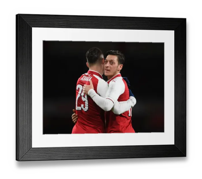 Framed Print : Xhaka and Ozil's Brilliant Moment: Arsenal's Goal Celebration vs Chelsea, Carabao Cup Semi-Final Framed Print : Xhaka and Ozil's Brilliant Moment: Arsenal's Goal Celebration vs Chelsea, Carabao Cup Semi-Final