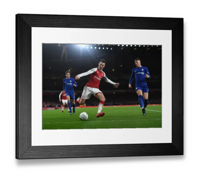 Framed Print : Arsenal's Koscielny Faces Off Against Chelsea's Barkley in Carabao Cup Semi-Final Showdown