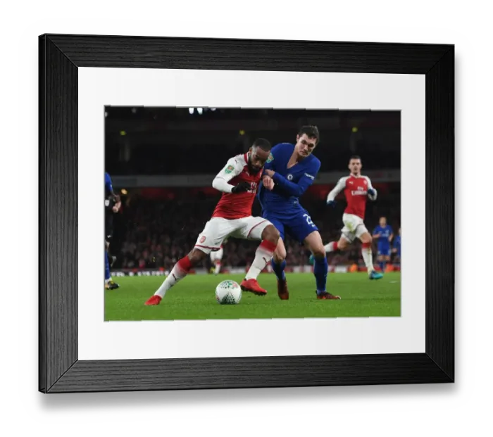 Framed Print : Arsenal's Lacazette Clashes with Chelsea's Christensen in Carabao Cup Semi-Final Showdown Framed Print : Arsenal's Lacazette Clashes with Chelsea's Christensen in Carabao Cup Semi-Final Showdown