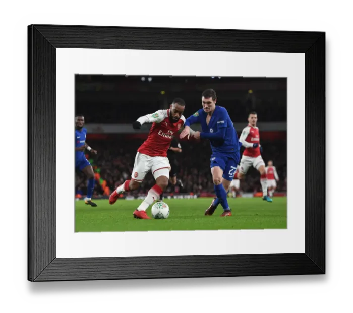 Framed Print : Arsenal's Alexandre Lacazette Clashes with Chelsea's Andreas Christensen in Carabao Cup Semi-Final Showdown