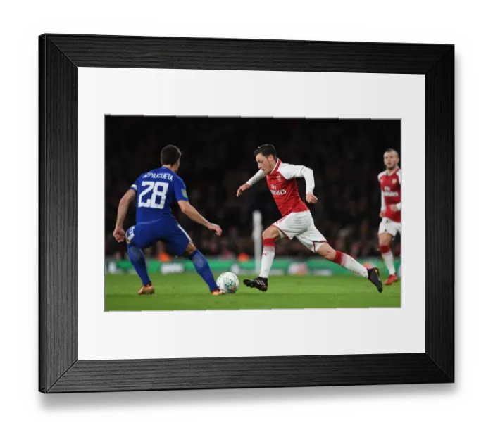 Framed Print : Mesut Ozil vs Cesar Azpilicueta: A Skillful Showdown in the Arsenal-Chelsea Carabao Cup Semi-Final