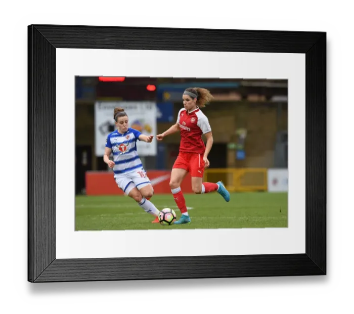 Framed Print : Clash of the Stars: Janssen vs. Bruton - Arsenal Women's Dominique Janssen Goes Head-to-Head with Lauren Bruton of Reading