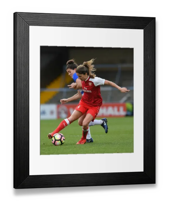Framed Print : Clash on the Pitch: Danielle van de Donk vs. Brooke Chaplen in Women's Super League Action