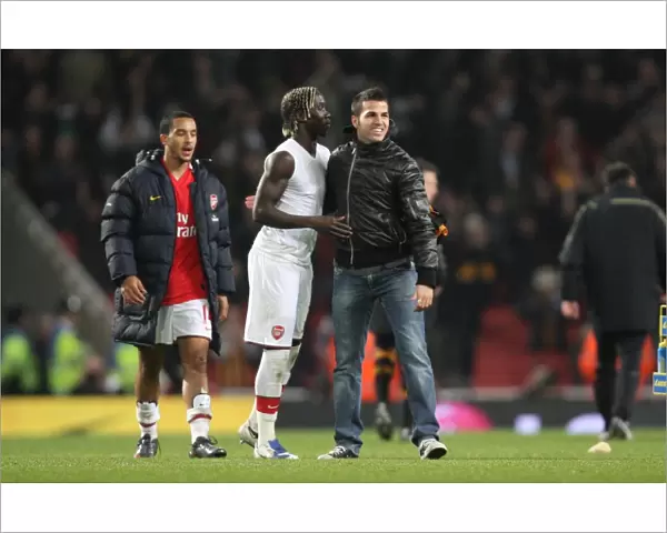 Arsenal captain Cesc Fabregas and Bacary Sagna celebrate