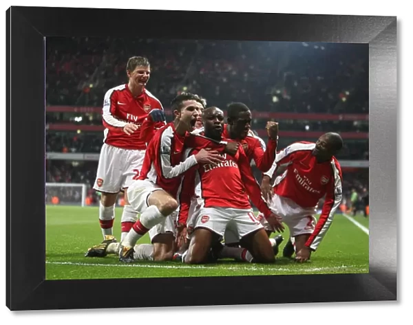 Arsenal's Victory: William Gallas and Teammates Celebrate Second Goal Against Hull City in FA Cup Sixth Round