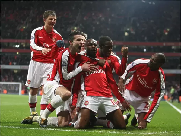 Arsenal's Victory: William Gallas and Teammates Celebrate Second Goal Against Hull City in FA Cup Sixth Round