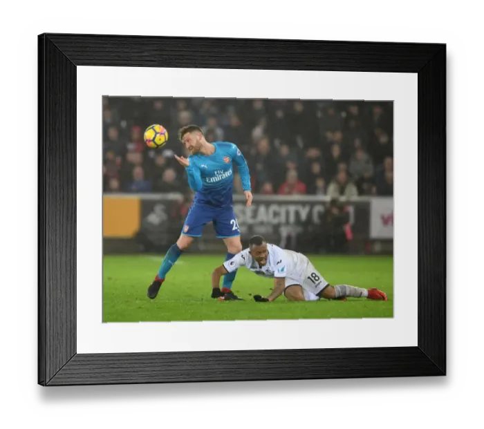 Framed Print : Mustafi vs Ayew: A Battle of Strength and Skill in the Swansea vs Arsenal Clash (2017-18) Framed Print : Mustafi vs Ayew: A Battle of Strength and Skill in the Swansea vs Arsenal Clash (2017-18)