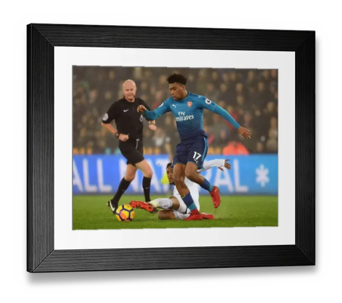 Framed Print : Arsenal's Alex Iwobi Outmaneuvers Swansea's Leroy Fer in Intense Premier League Clash Framed Print : Arsenal's Alex Iwobi Outmaneuvers Swansea's Leroy Fer in Intense Premier League Clash