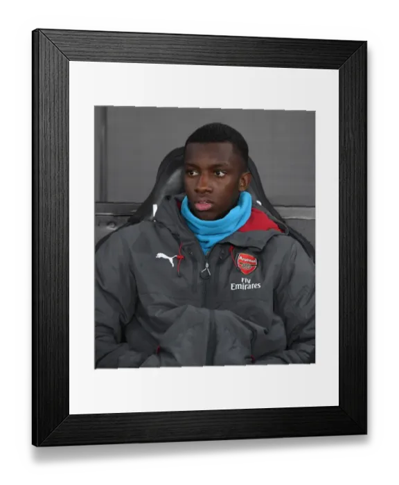 Framed Print : Eddie Nketiah on the Bench: Swansea City vs Arsenal, Premier League 2017-18 Framed Print : Eddie Nketiah on the Bench: Swansea City vs Arsenal, Premier League 2017-18