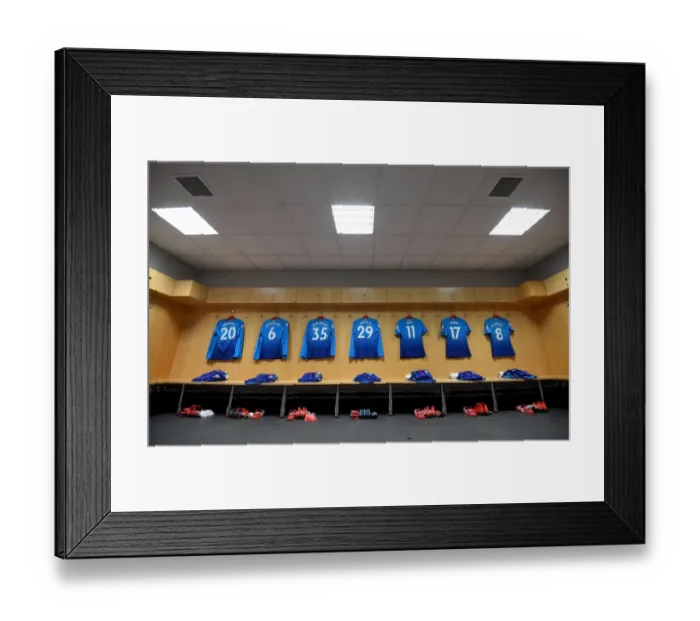 Framed Print : Arsenal's Preparedness: A Peek into the Team's Changing Room before Swansea Clash (2017-18)