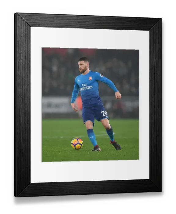 Framed Print : Shkodran Mustafi: Arsenal's Defender in Action Against Swansea City, Premier League 2017-18 Framed Print : Shkodran Mustafi: Arsenal's Defender in Action Against Swansea City, Premier League 2017-18