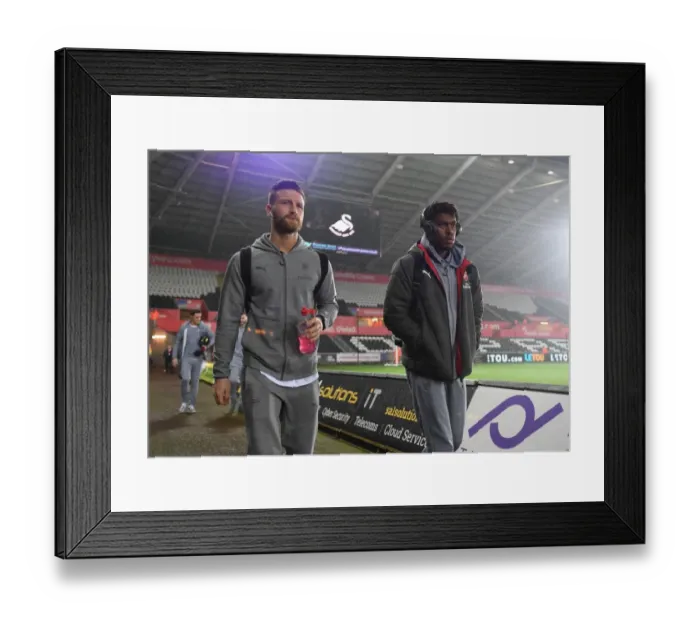Framed Print : Arsenal Players Shkodran Mustafi and Alex Iwobi Arrive at Swansea City Stadium before Premier League Match, 2018