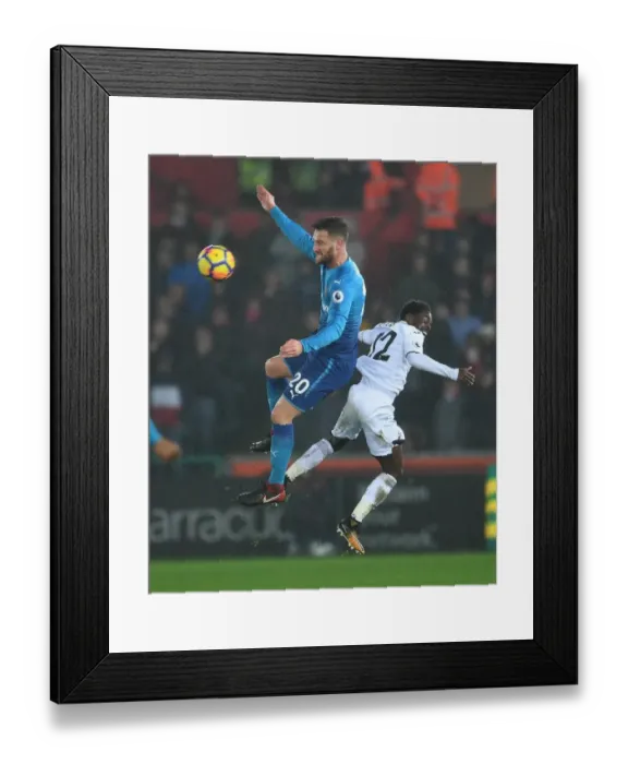 Framed Print : Shkodran Mustafi (Arsenal) Nathan Dyer (Swansea). Swansea 3: 1 Arsenal. Premier League