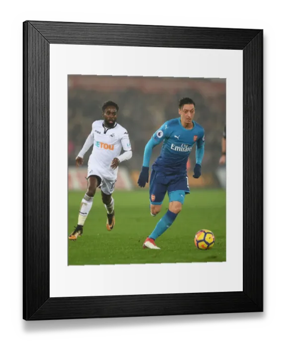Framed Print : Mesut Ozil vs. Nathan Dyer: Clash at Swansea's Liberty Stadium (Swansea City v Arsenal 2017-18)